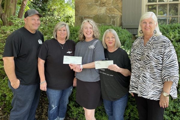 L-R: Chris & Christy McCombs - C & C Motor Company, Beverly Riddlesperger - Leeds Outreach, Sheila Vick - Backpack Buddies and Sandra McGuire - Leeds Area Chamber of Commerce Executive Director.
